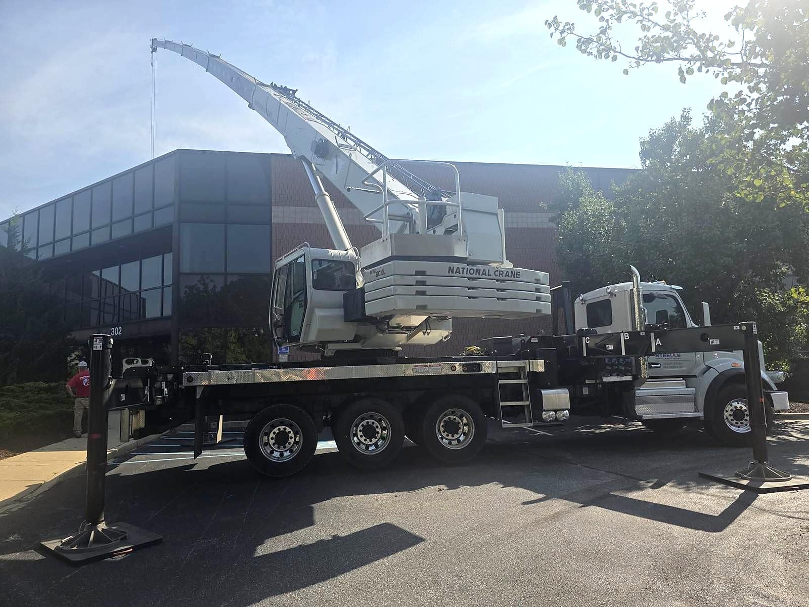 Steedle Crane truck crane staged for commercial lift work
